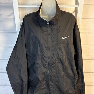 Nike Black Men's Lightweight Windbreaker with White Swoosh